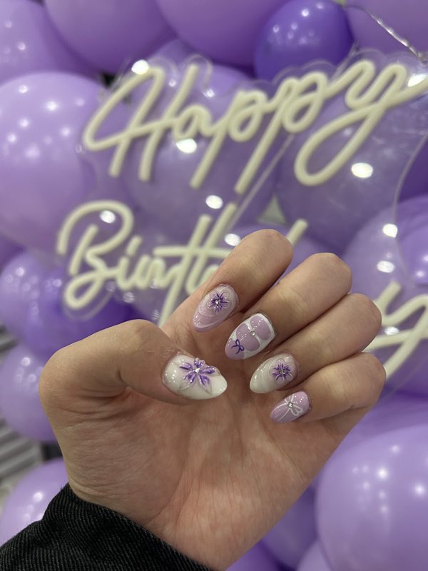 Custom purple floral nail art