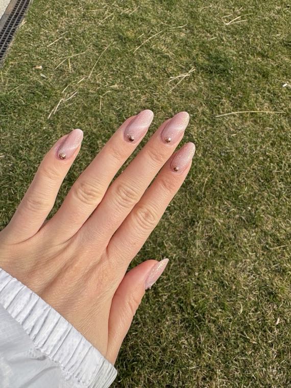 Natural nude almond nails with shimmer